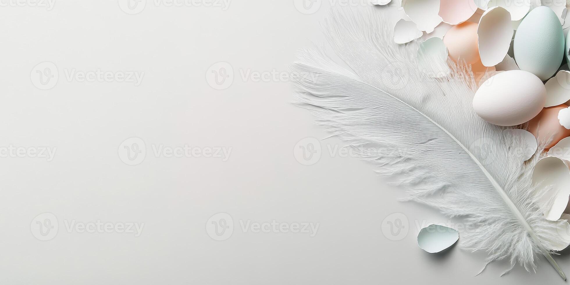 White feather and broken eggshells on soft pastel background easter concept photo
