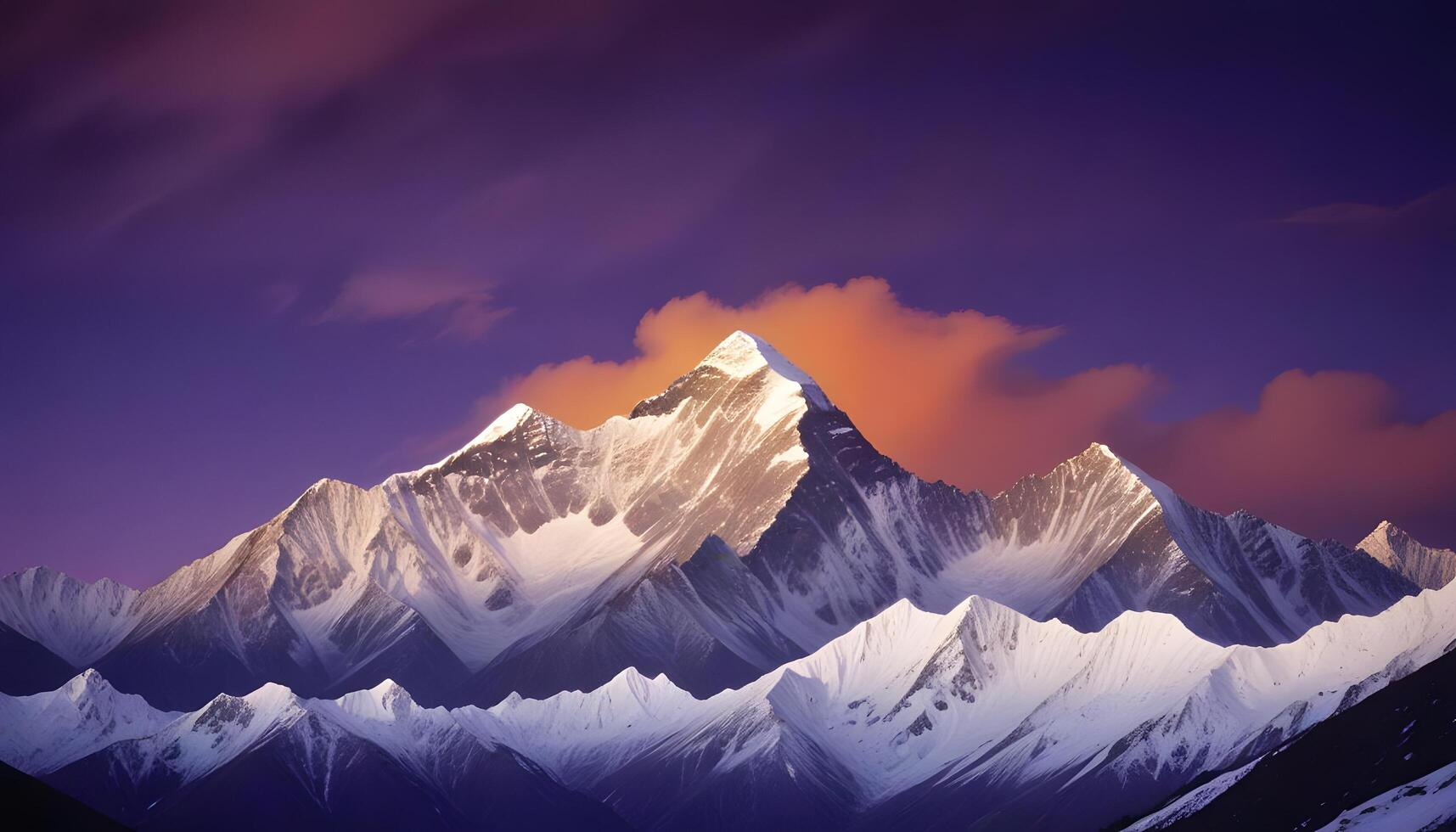 A mountain range with snow capped peaks photo