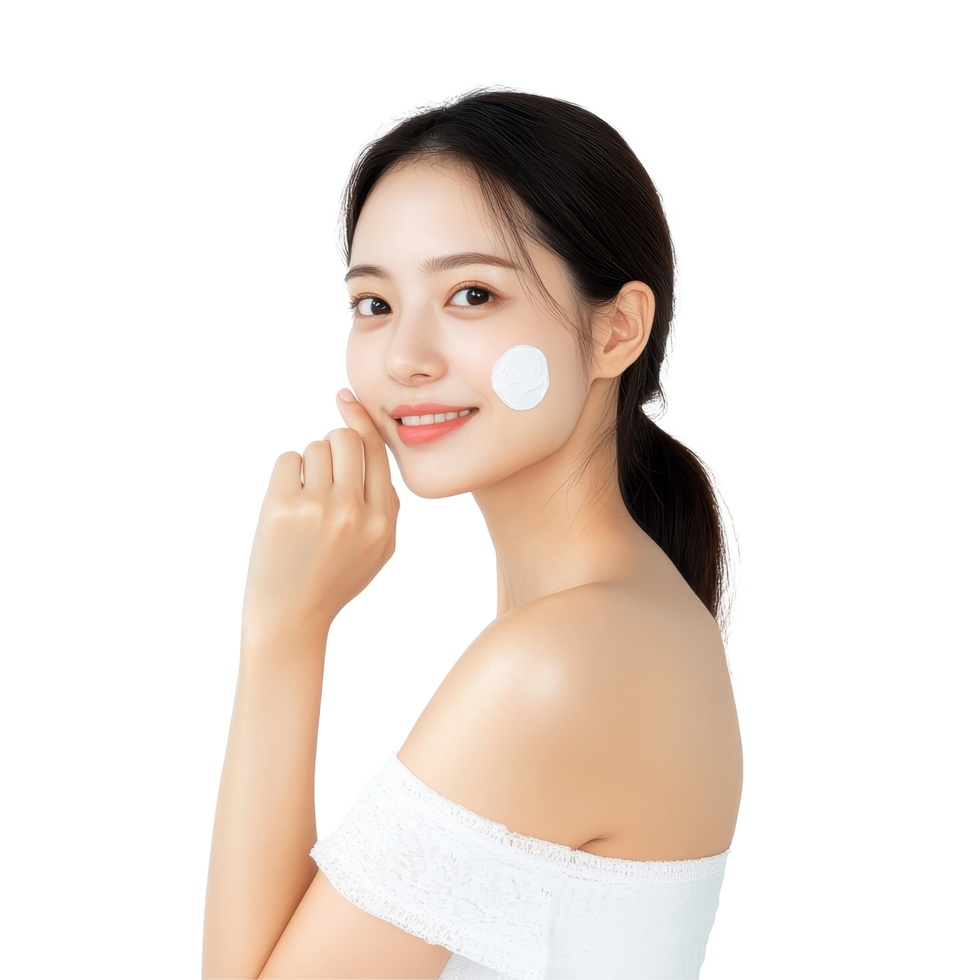 Beautiful young Asian woman applying sunscreen indoors with a radiant smile in a softly lit studio, Studio shot Beautiful young Asian woman applying lotion on shoulder isolated transparent background png