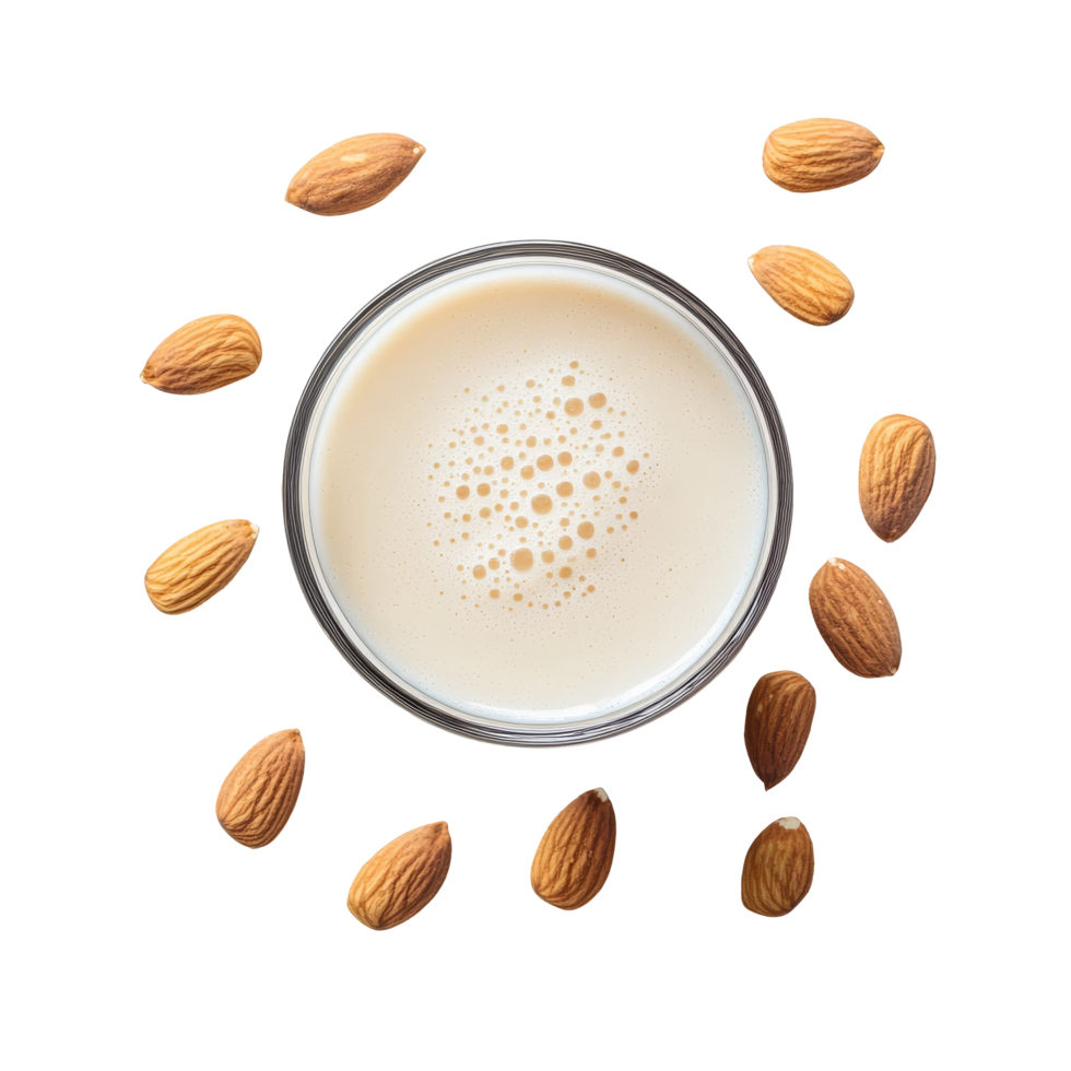 Refreshing glass of almond milk surrounded by raw almonds on a clean transparent background, Glass of almond milk with raw almonds over transparent background flat lay png