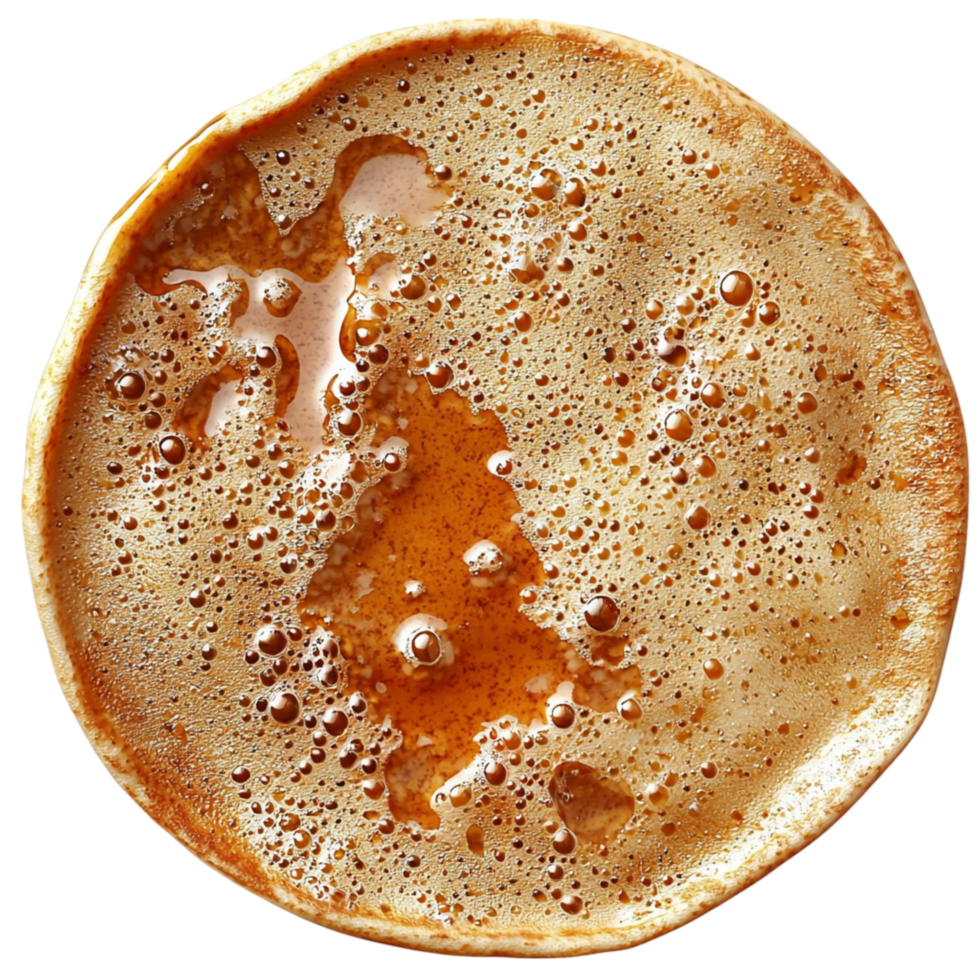 Bubbly golden brown pancake with a surface and fluffy texture png