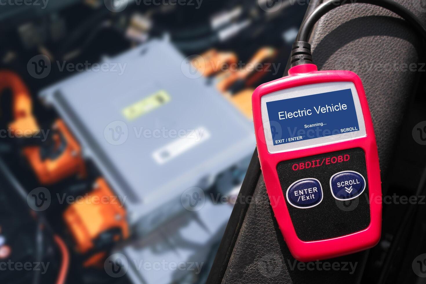 OBD-II Scanner displaying electric vehicle data scanning process , Car code reader scan tool , Car repair concept photo