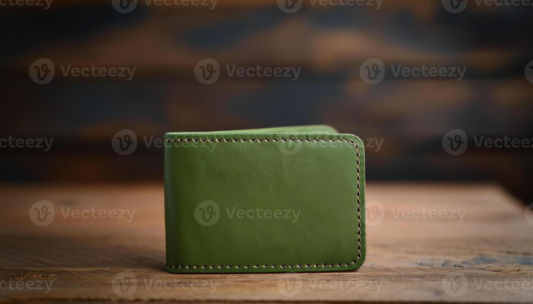 Minimalist green leather wallet on wooden table. Close-up. Simplicity and elegance. photo