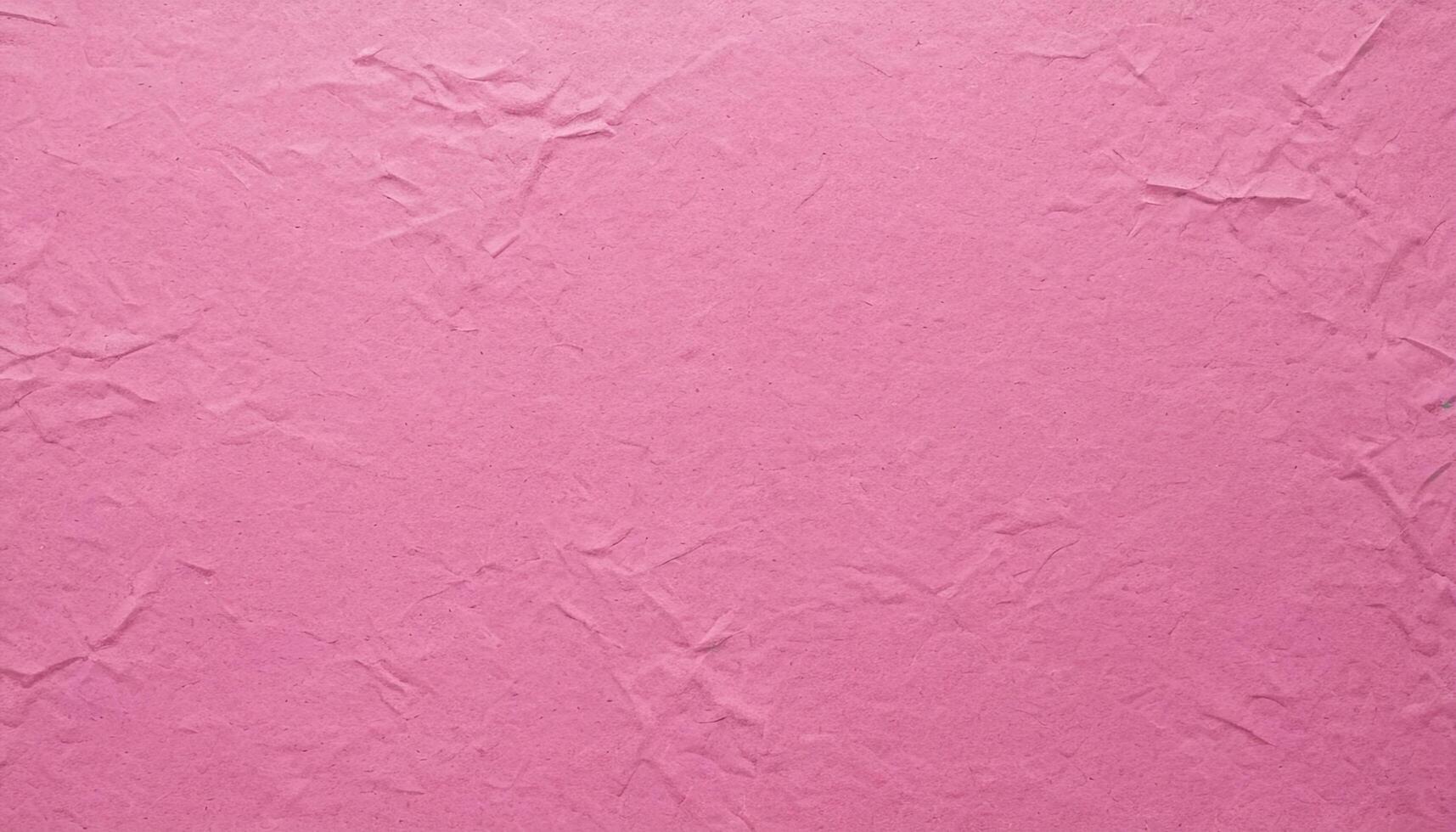 Crumpled Pink Paper Texture Background with Wrinkled Surface Design and Abstract Pattern photo