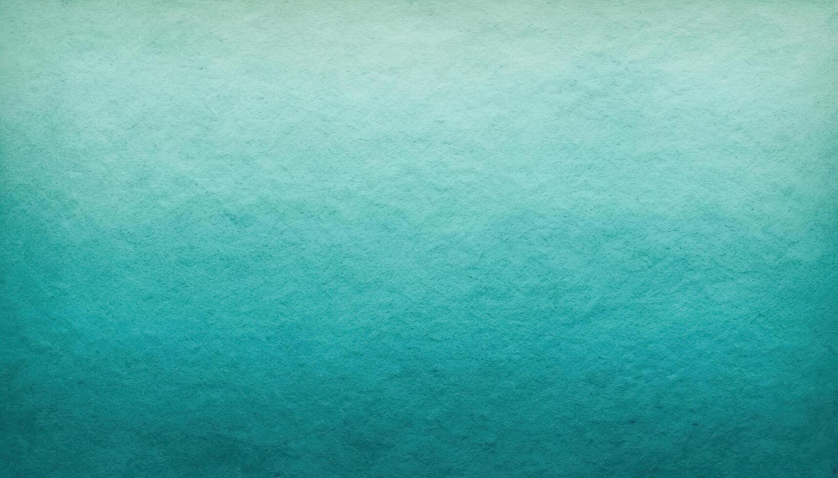 Elegant Turquoise and Teal Watercolor Wash with a Smooth Gradient on Textured Paper photo
