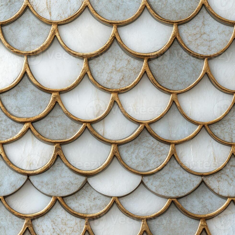 Decorative tile pattern with shell-like design in grey and gold photo