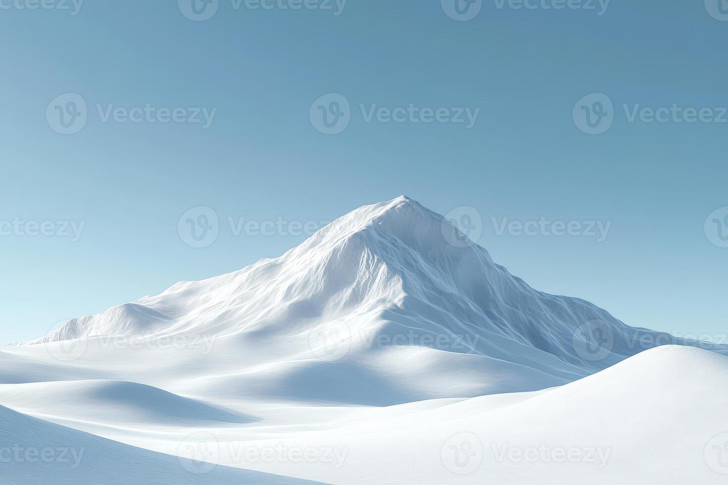 Snow-covered mountain under clear blue sky at midday photo