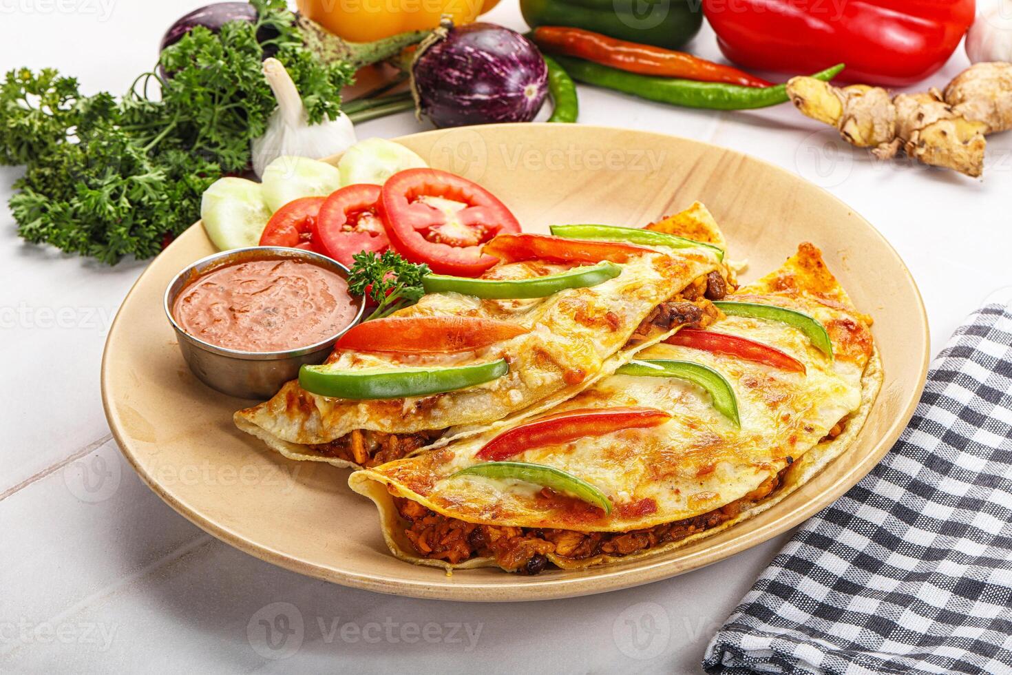 A plate of food with vegetables and dip photo
