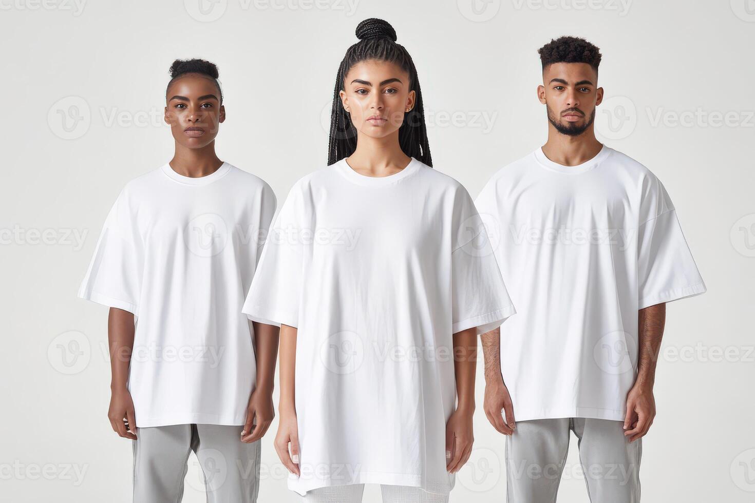 Three models showcasing modern fashion in oversized white tees photo