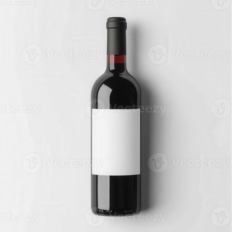 Elegant red wine bottle with blank label on white background photo