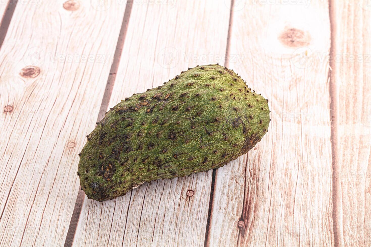 A fruit on a wooden table photo