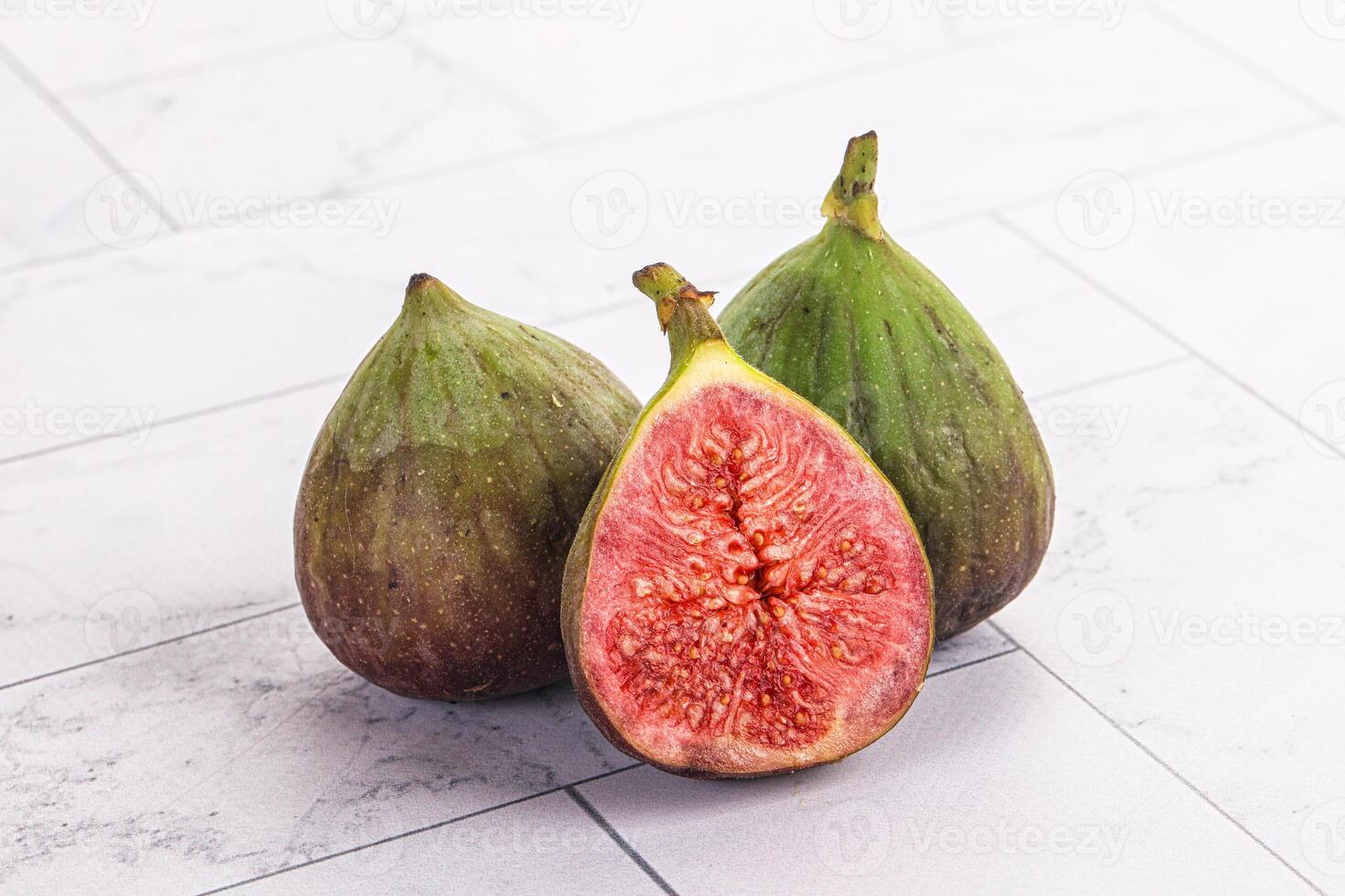 A close up of three figs photo