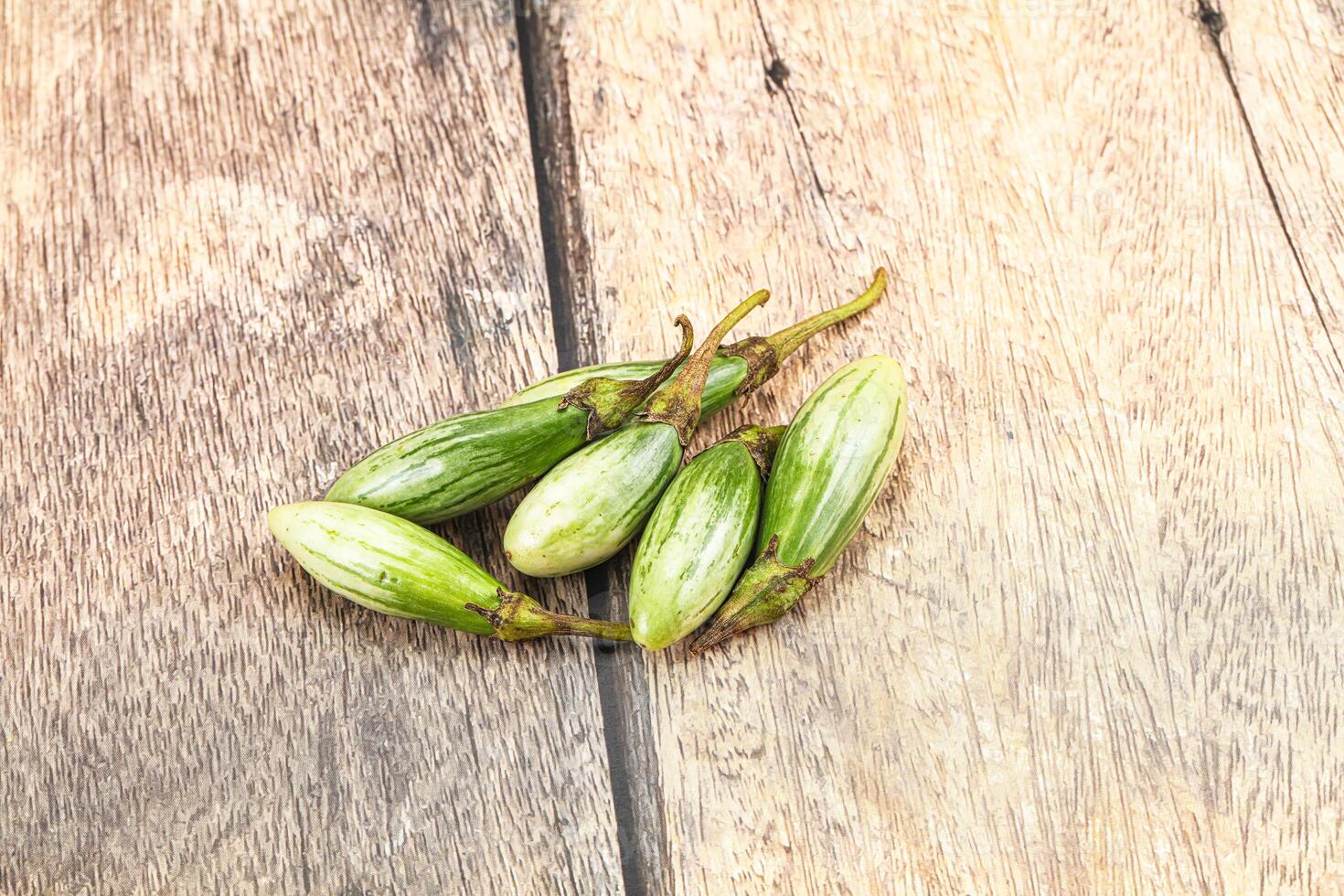 Okra on wooden table photo
