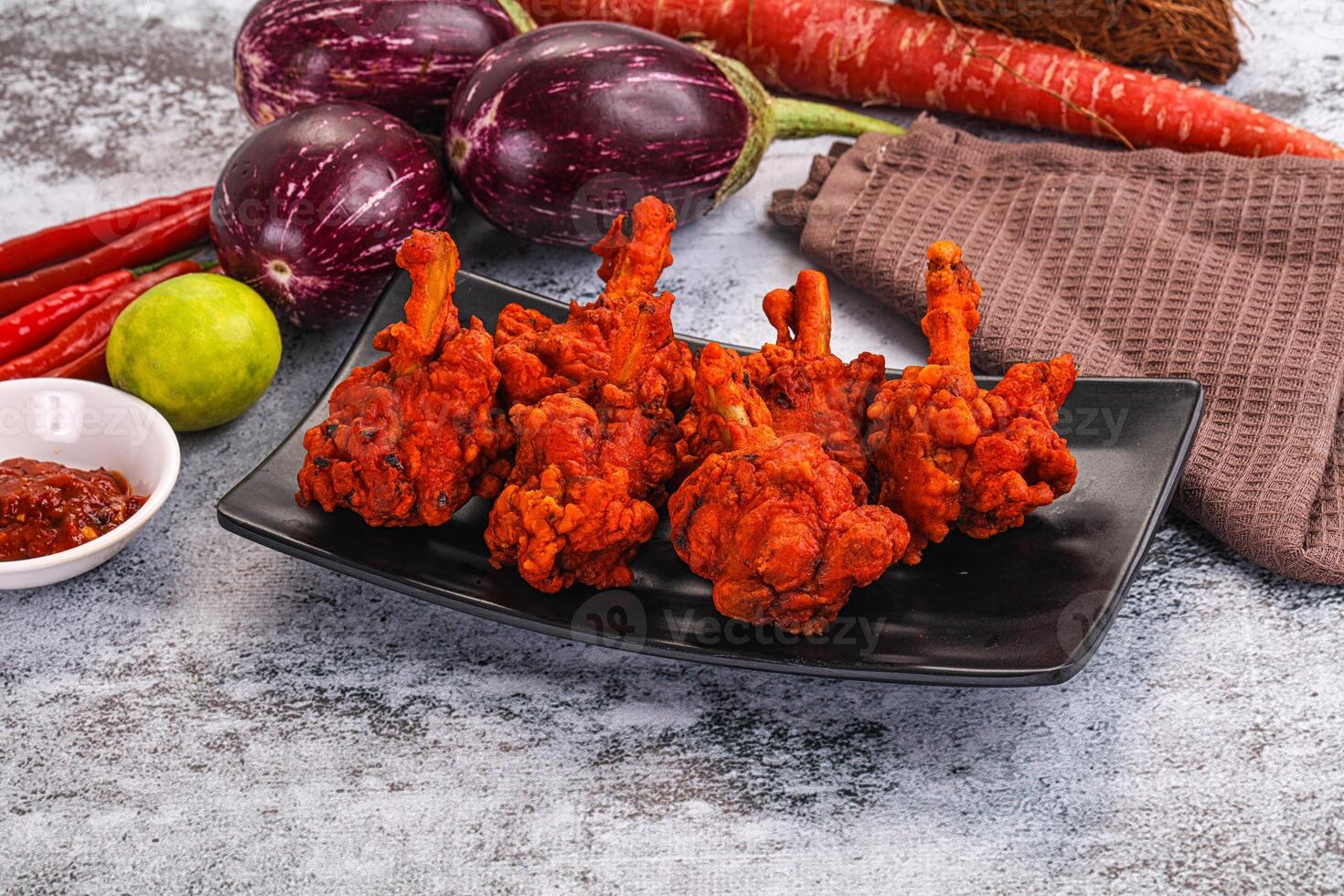 A plate of food with vegetables and spices photo
