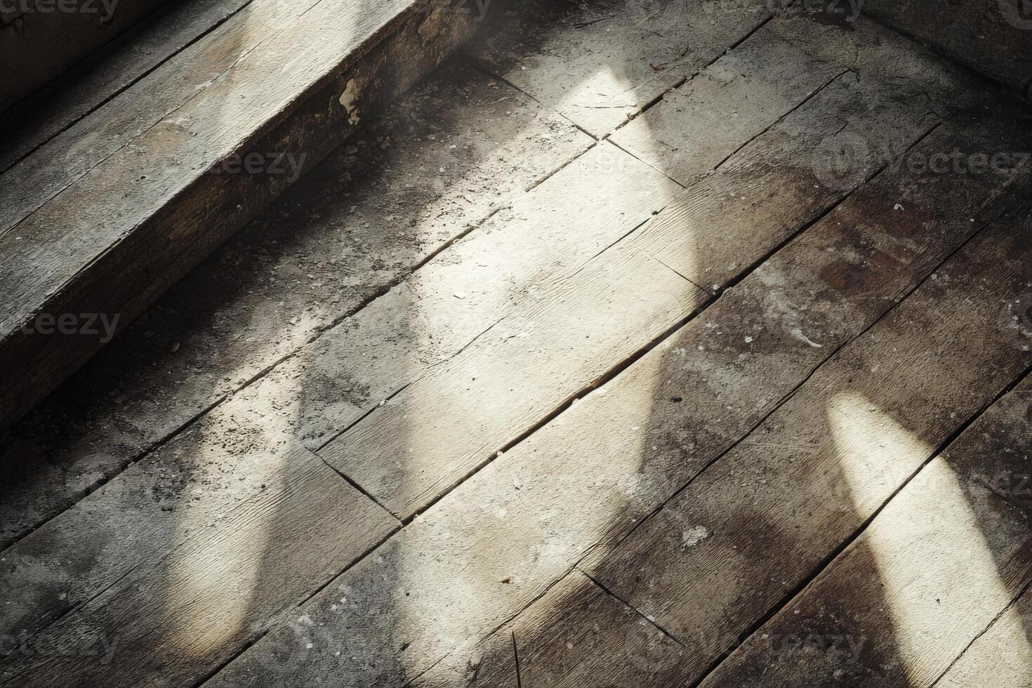 An old wooden floor with sunlight coming through the window photo