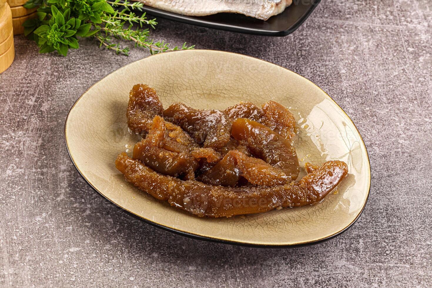 A plate of food with some sauce on it photo