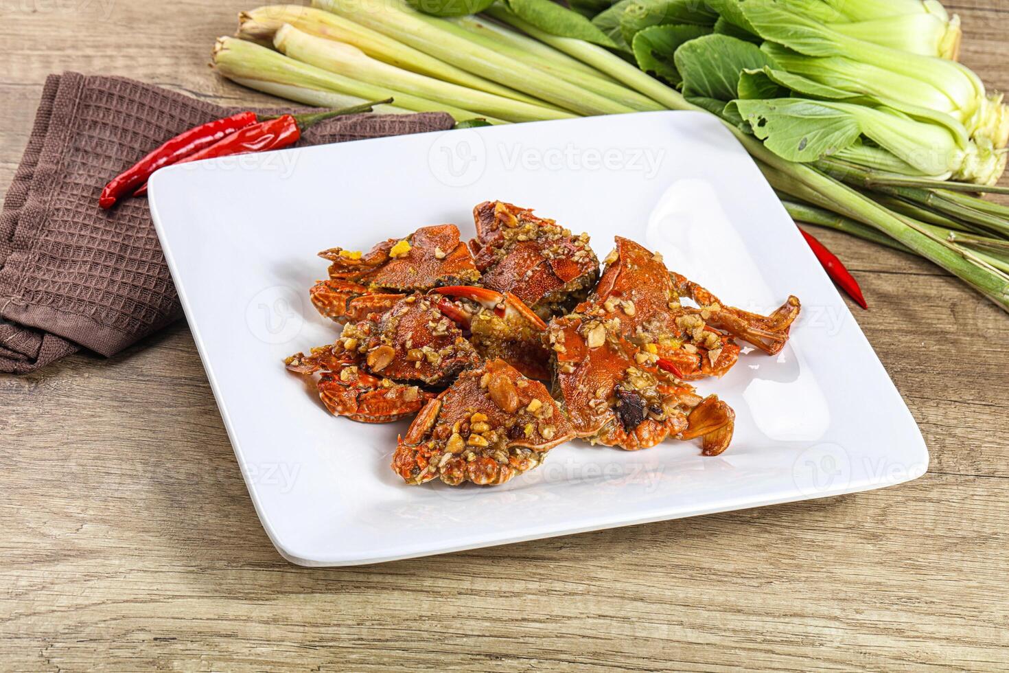 A plate of food on a table with a napkin photo