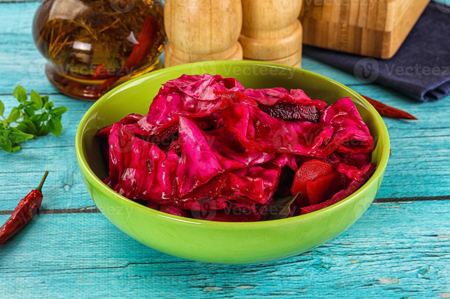 A bowl of red cabbage with red peppers and spices photo