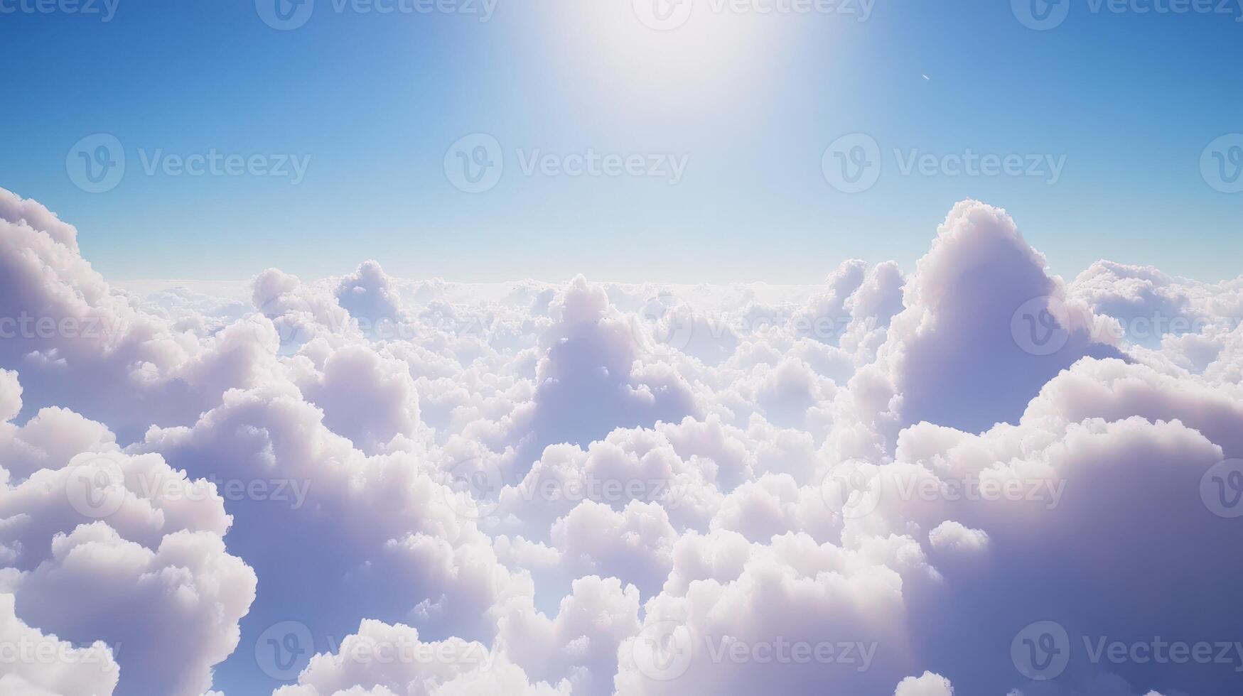 Vast blue sky filled with fluffy white clouds under bright sun photo