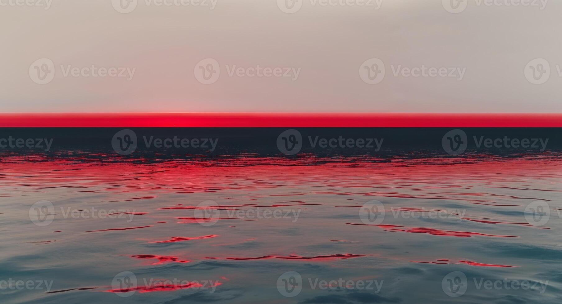 Red Horizon Line Reflecting On Dark Water photo