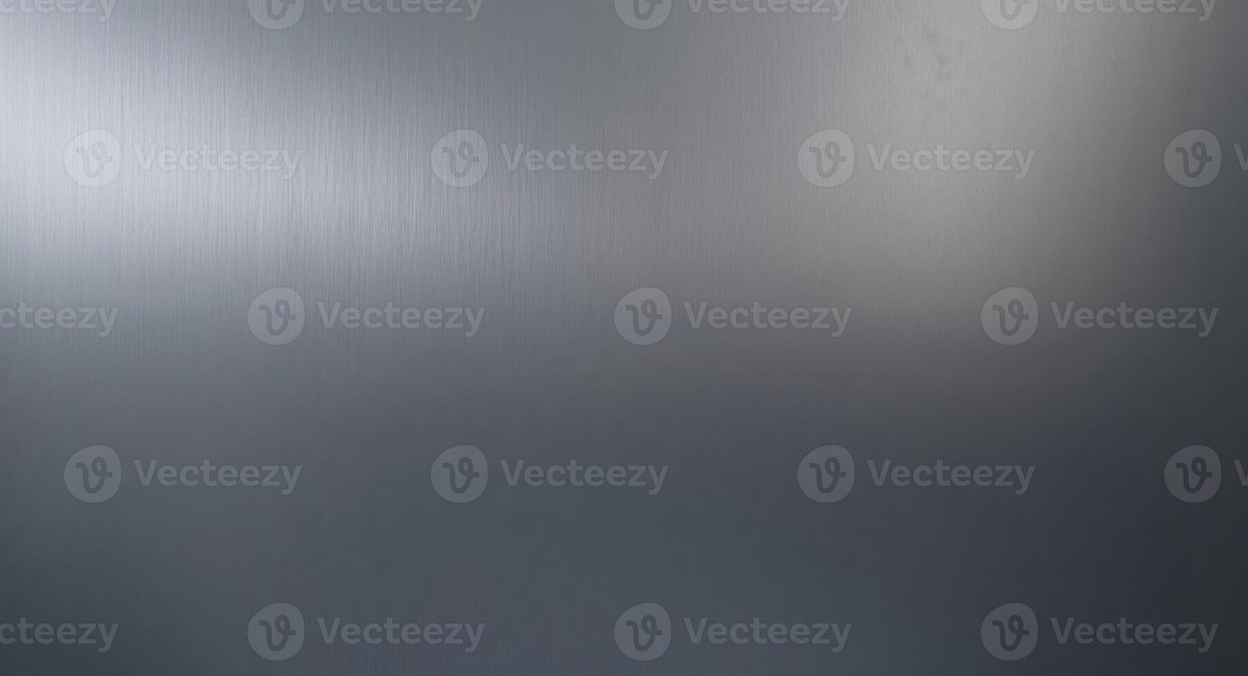 A deep graphite gray blending into a muted pewter silver brushed metal gradient background photo