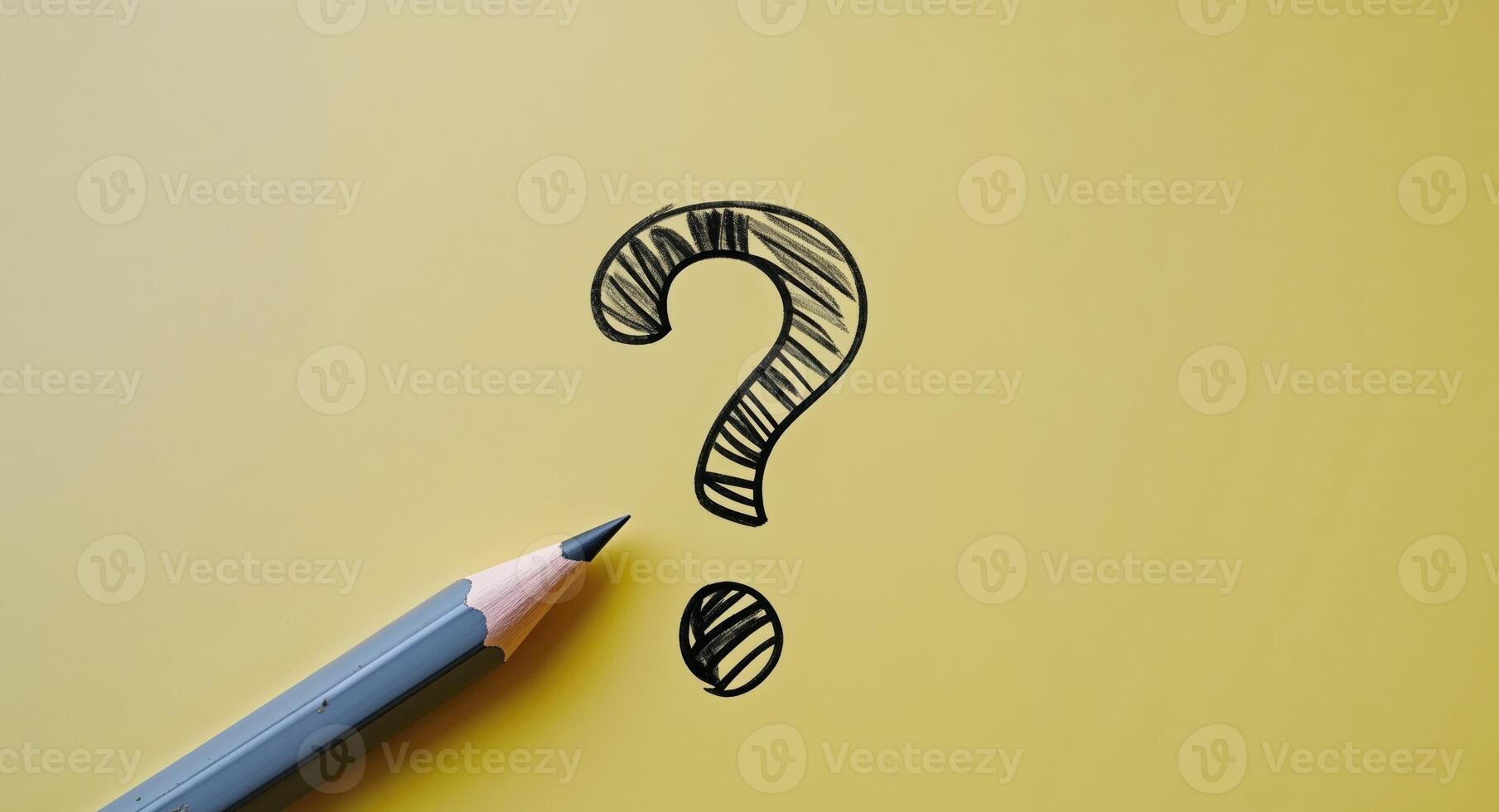 Question mark concept with pencil on yellow background photo