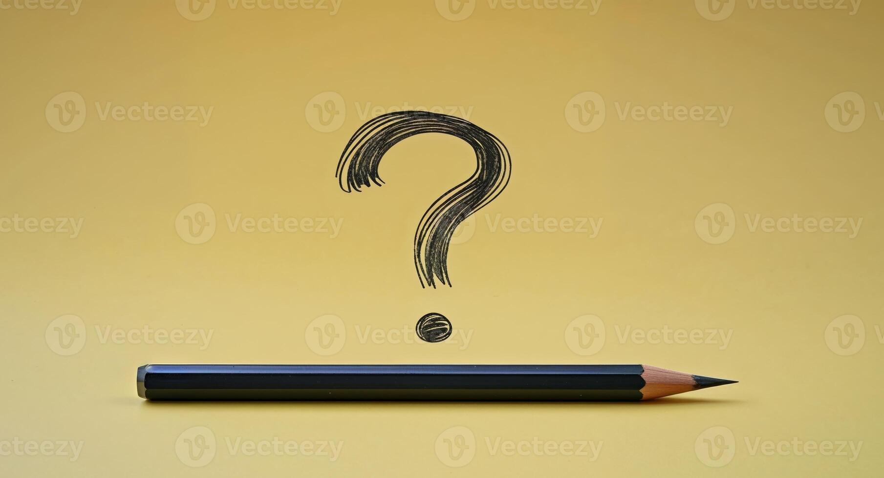 A pencil and a question mark scribble on a yellow background. photo