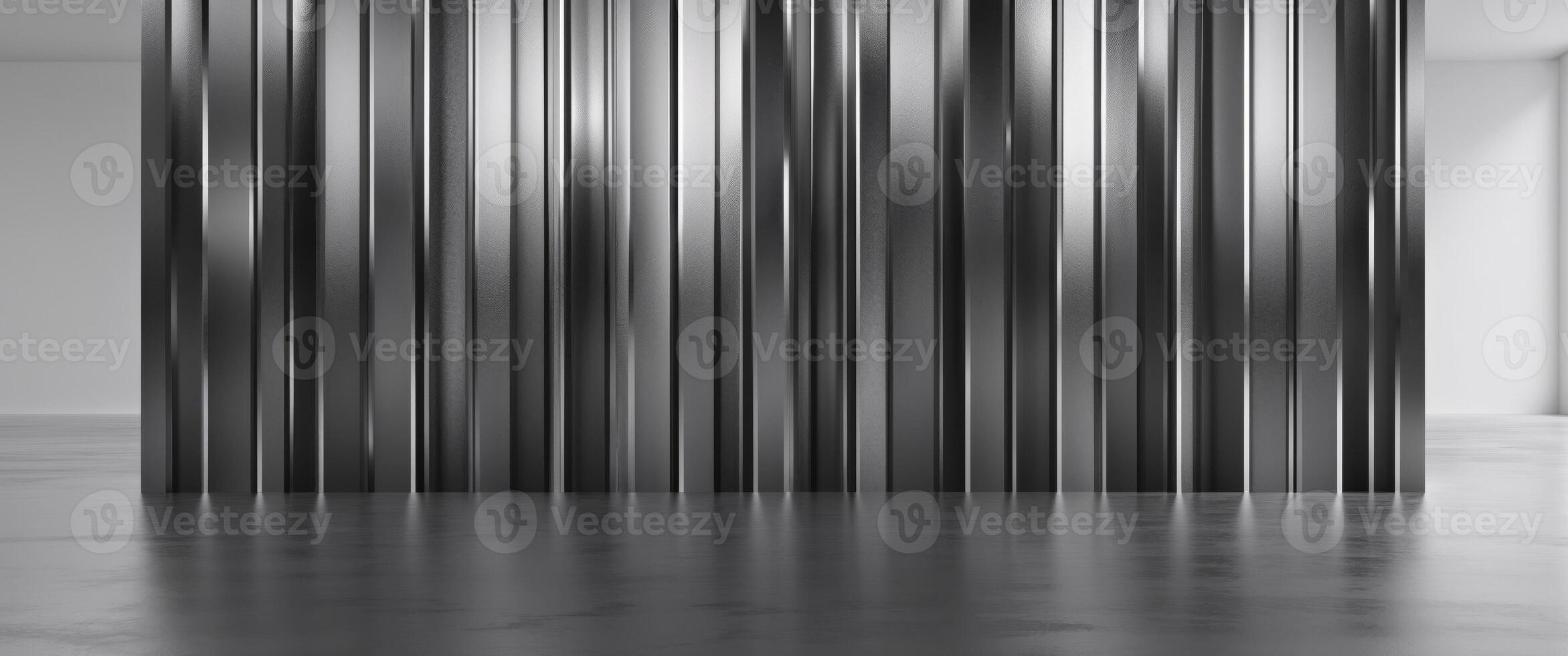 A black and white image of a room with a wall of metal photo