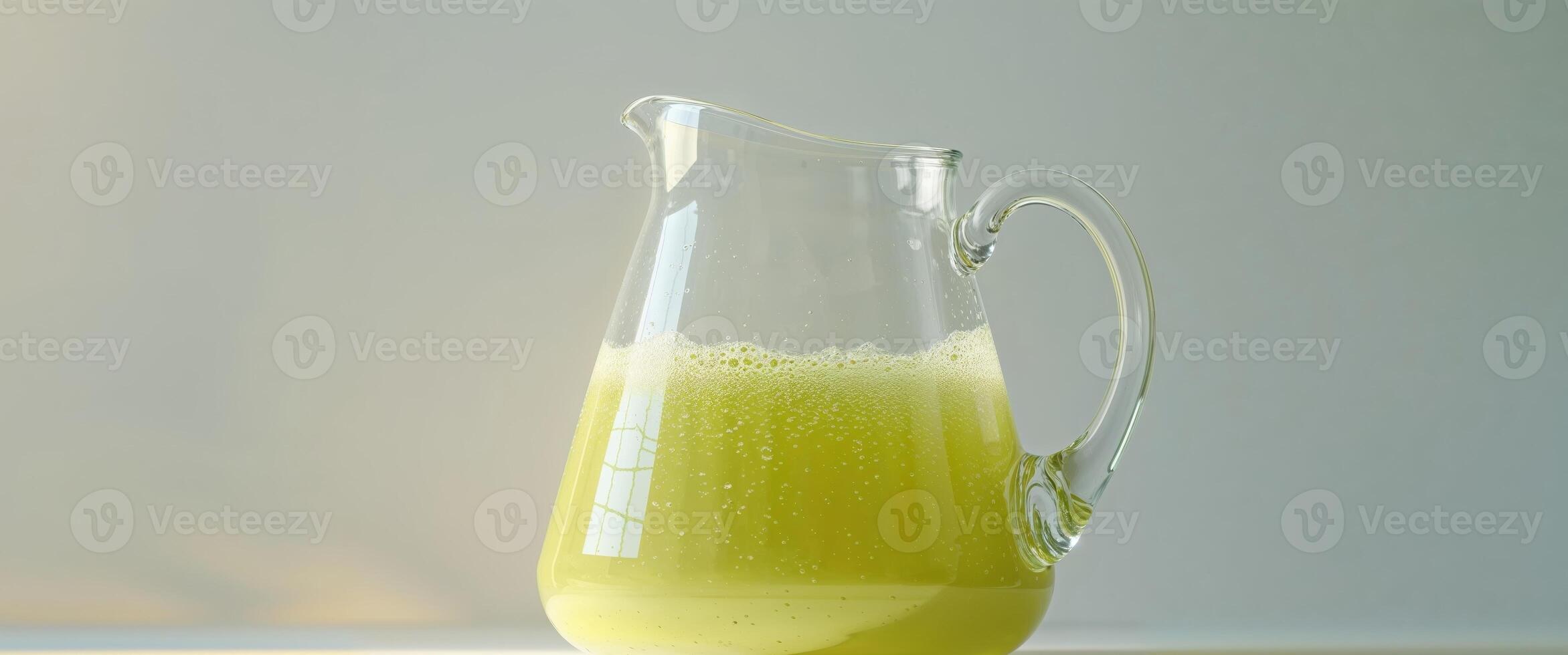 Refreshing Apple Juice in a Glass Pitcher photo