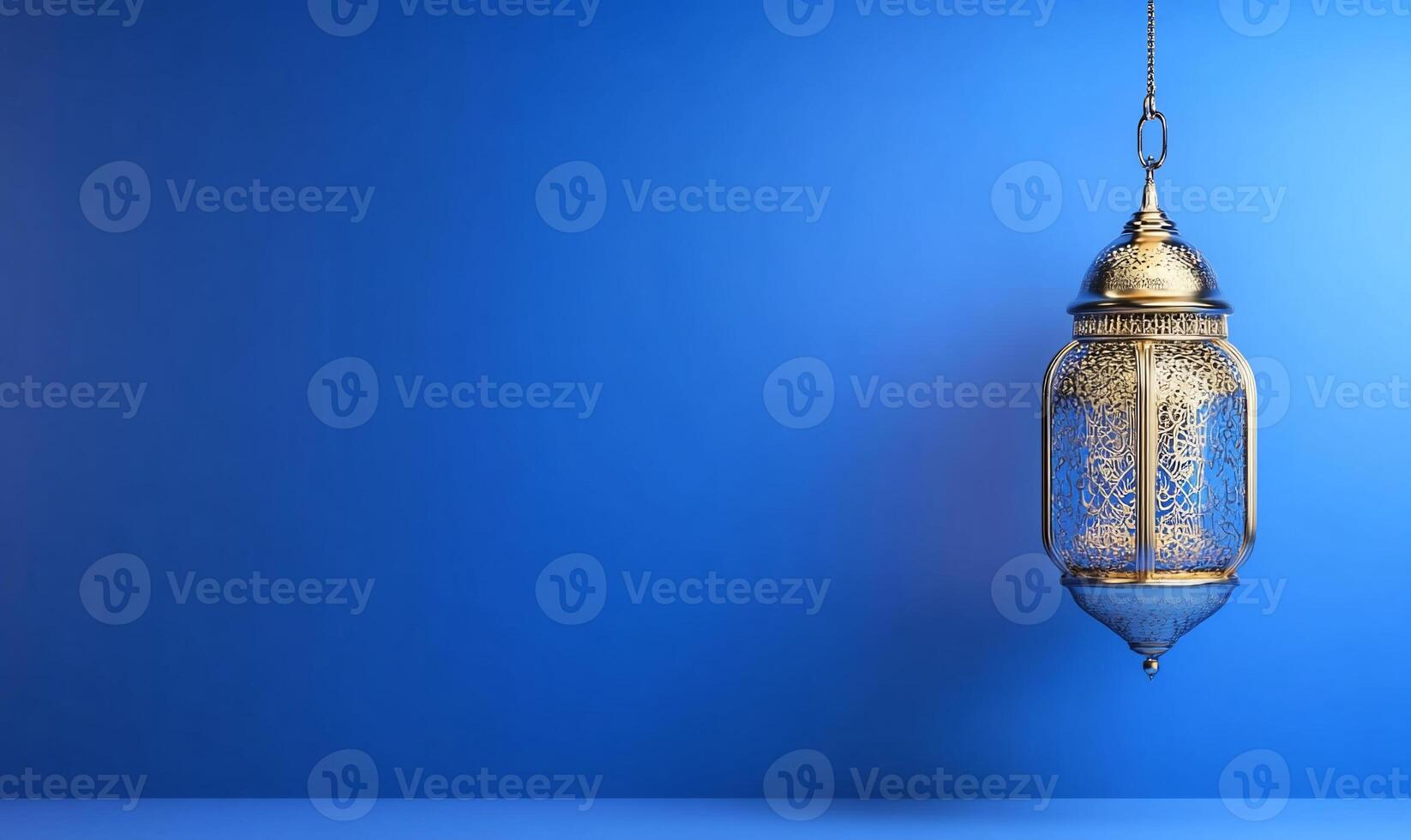 A decorative lantern hanging against a vibrant blue background. photo