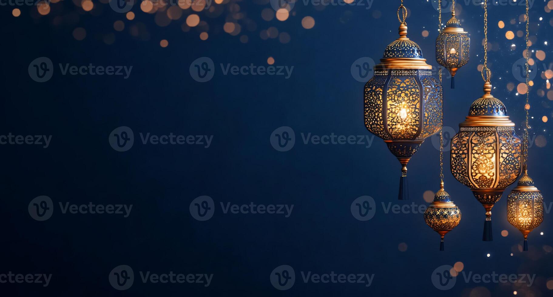 Decorative lanterns glowing against a dark blue background. photo