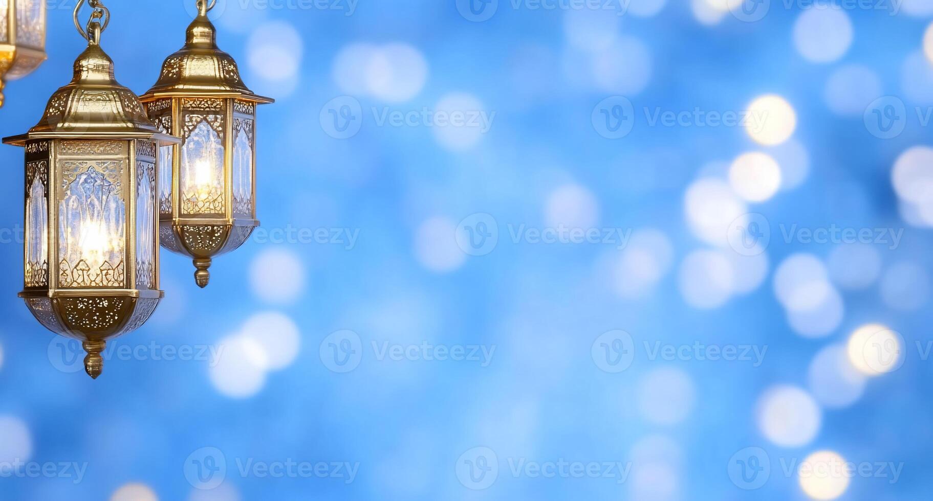 Decorative lanterns against a blurred blue background with bokeh lights. photo