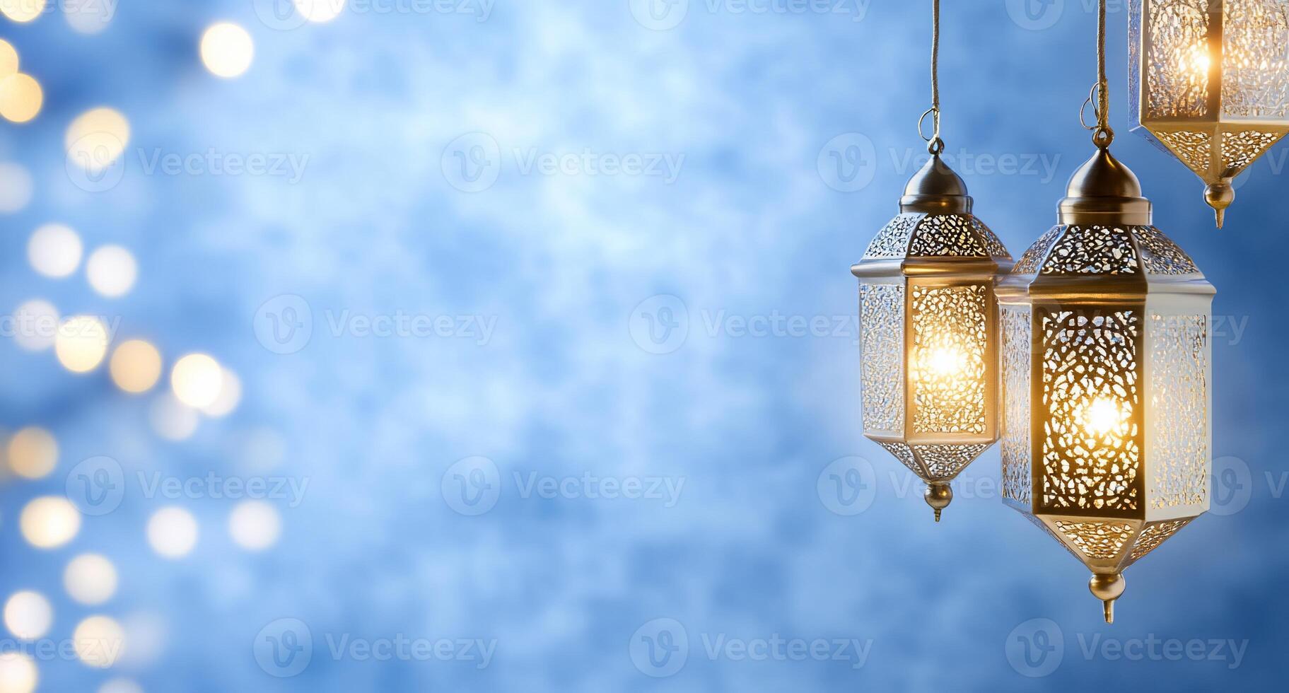 Elegant lanterns illuminate a soft blue background with bokeh lights. photo