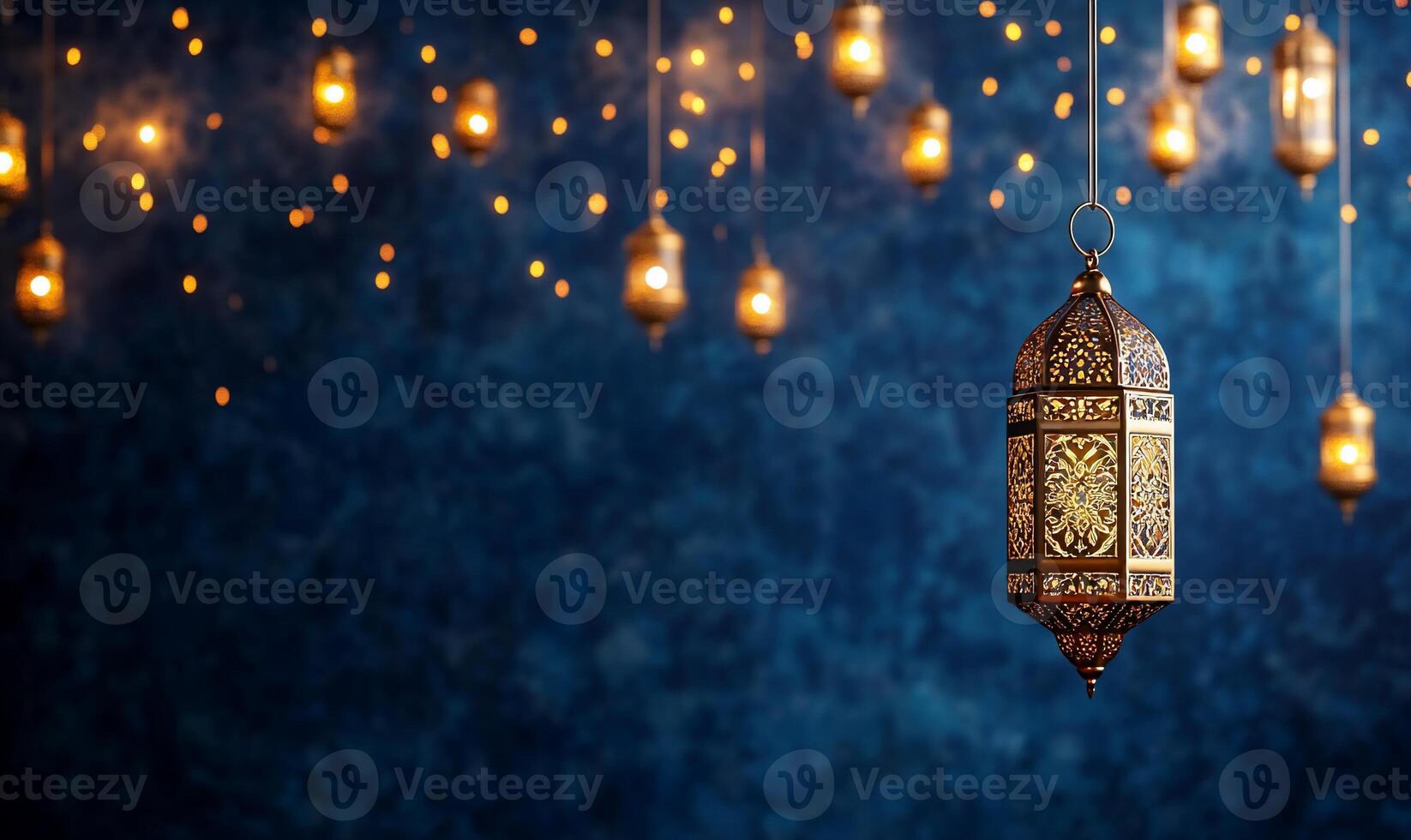 A decorative lantern hangs against a blue backdrop with glowing lights. photo