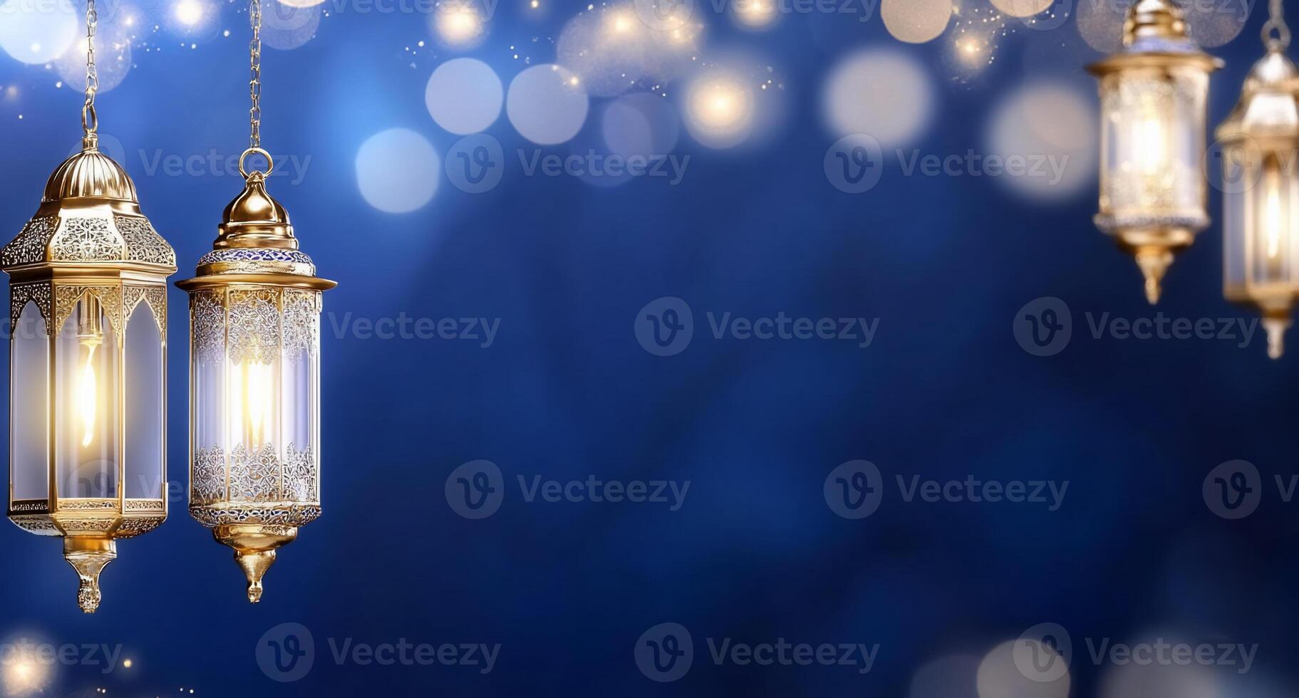 Elegant lanterns glowing against a blurred blue background. photo
