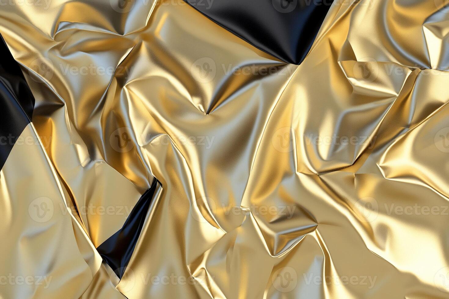 A close-up of crumpled gold and black metallic foil textures. photo