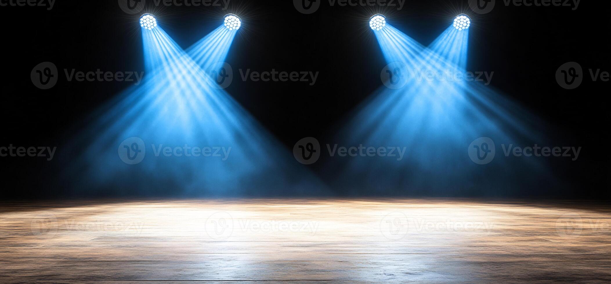 Stage spotlights on wooden floor, dark background. Event backdrop photo