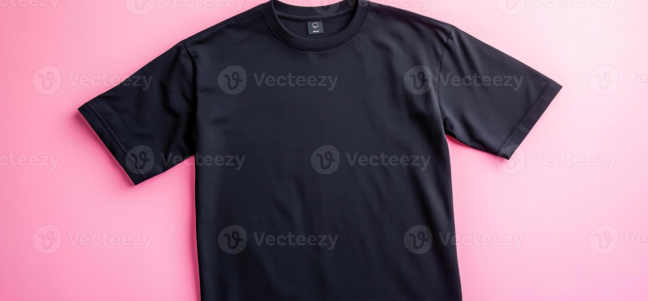 Black T-shirt on pink background, apparel mockup photo