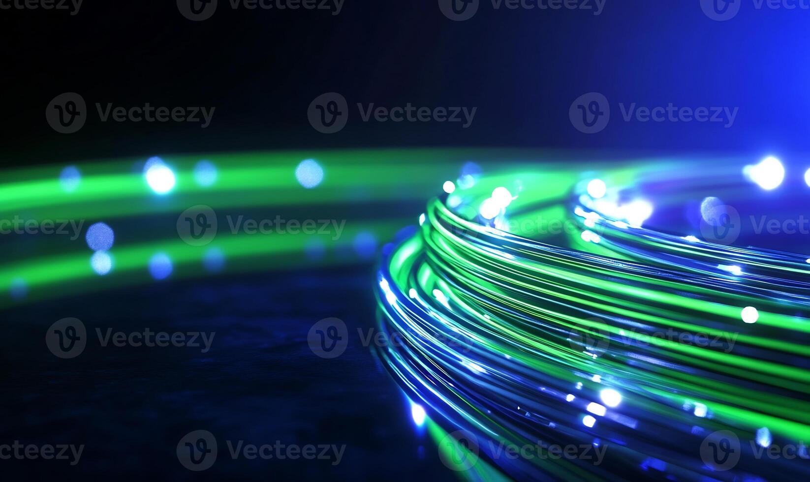 Glowing fiber optic cables swirl, dark background. Tech concept photo