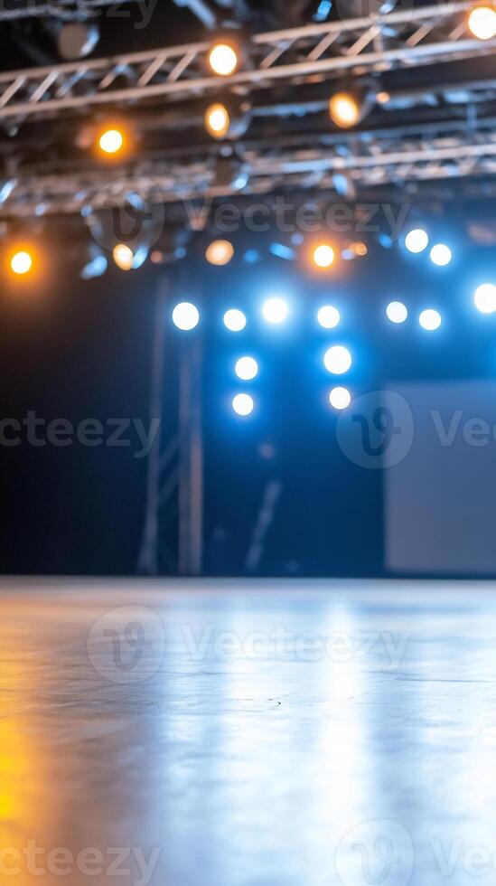 Empty stage, bright lights, event venue, performance preparation photo