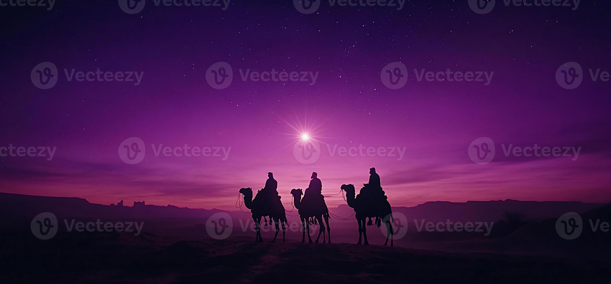 Three camels stand in front of a purple sky photo