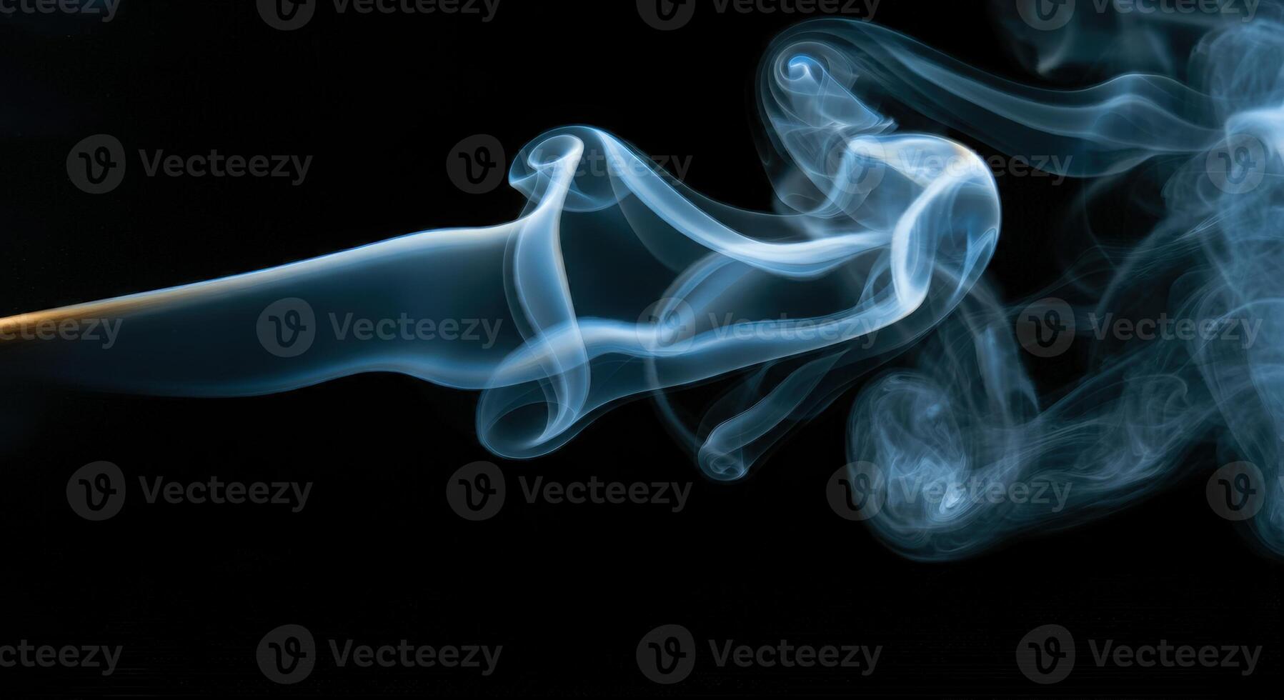 A close up of a lit match being blown out photo