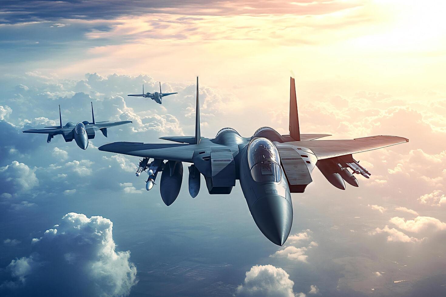 Three f-15 eagle fighter jets flying in formation over clouds during sunset photo