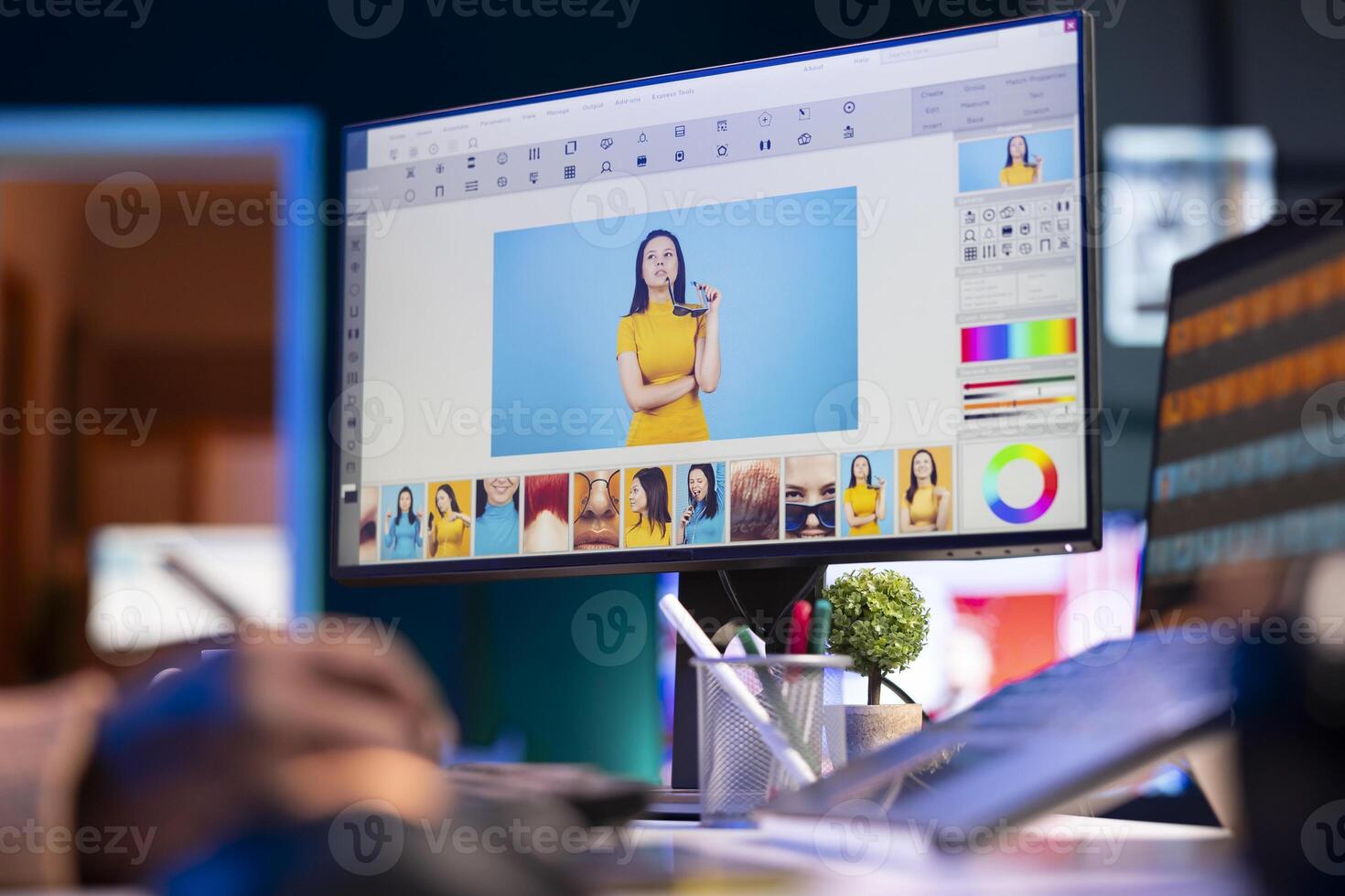 African american graphic designer working on photo retouching project on dual monitors in a modern office setting at his home. Man showcasing creativity in digital editing software.