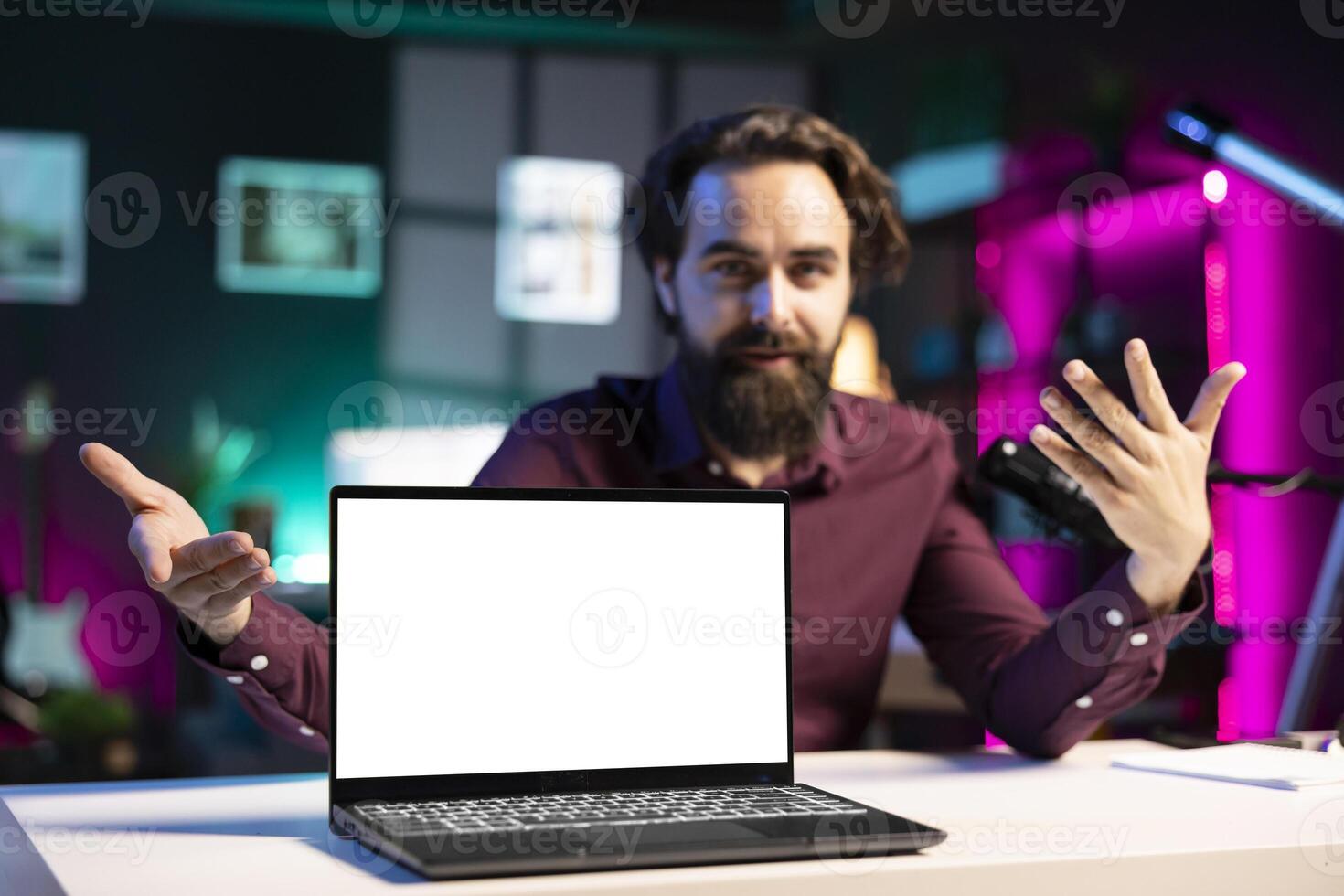 Close up shot of isolated screen laptop used by man as empty copy space to showcase his online streaming channel logo. Cheerful media star does introductory using mockup notebook photo