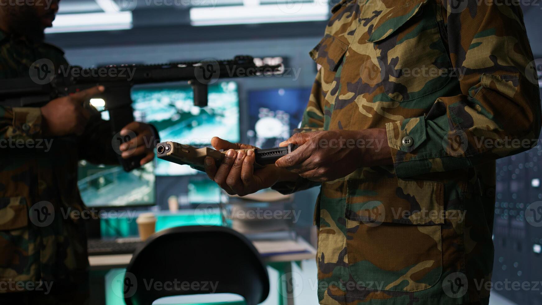 Military officers doing weapons maintenance in war room, ensuring bullets and supplies are working properly. Close up of army infantry units holding guns, managing combat load gear, camera B photo