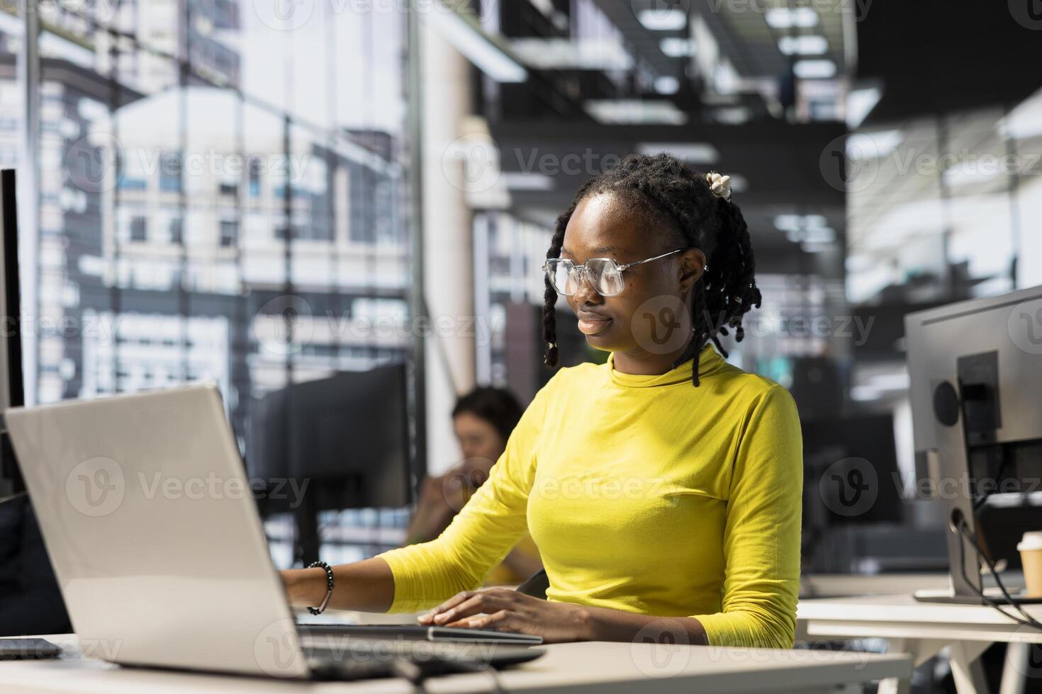 IT employee designing, developing and maintaining software applications using various programming languages. Full stack developer debugging company servers, preventing failures photo