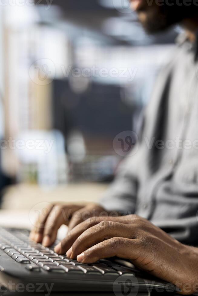 African american manager analyzing company data for strategic planning, solving resource allocation and effective business operations. Expert does financial forecasting and data analysis. Close up. photo
