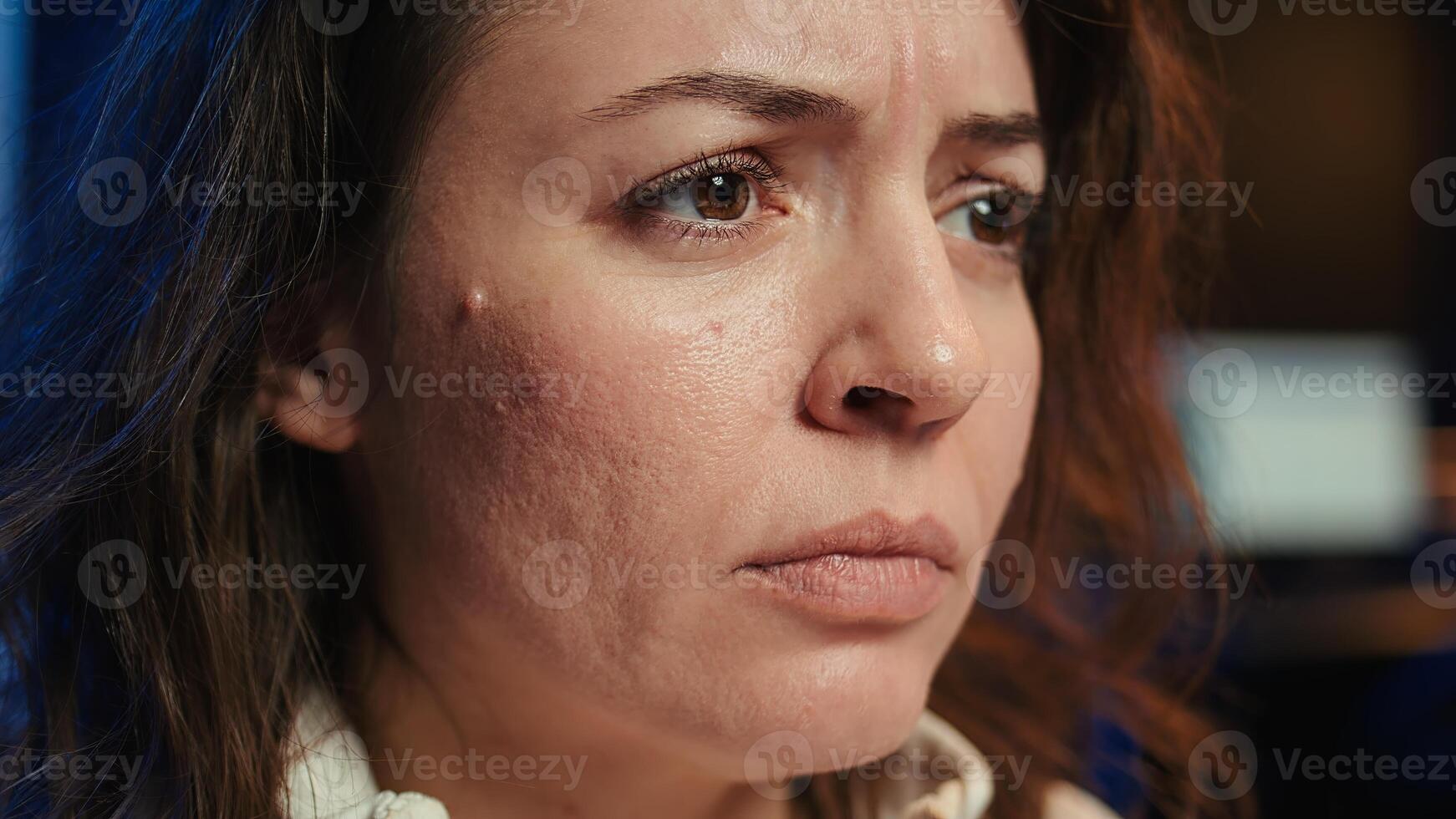 Upset teleworking engineer worried after failing to secure company servers from virus attacks, close up. Anxious woman stressed about being unable to build firewalls protecting data, camera B photo