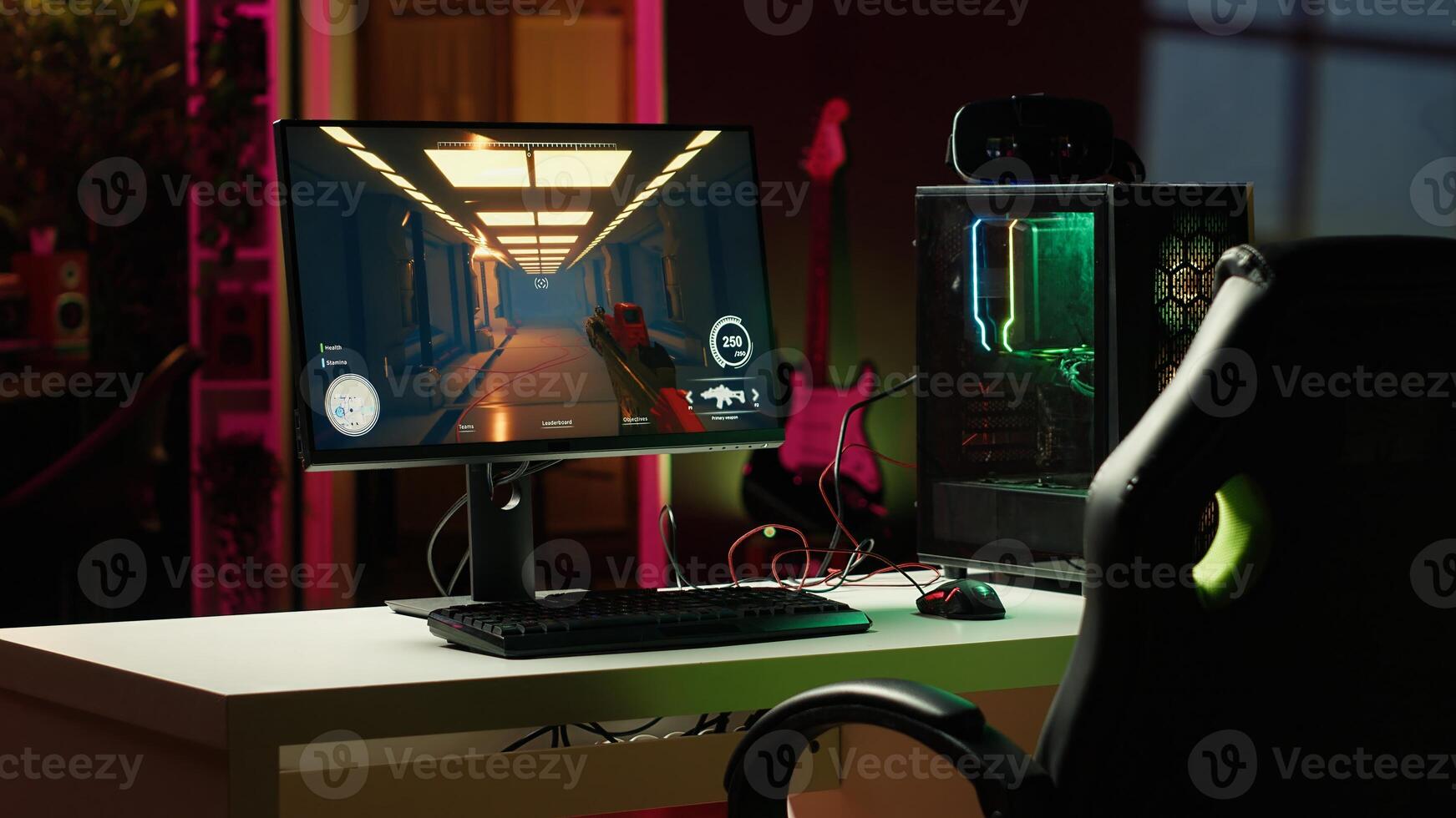 Stylish empty apartment with neon lights and computer screen left open at night showing videogame UI interface. Home living room with no people in and PC display left open photo